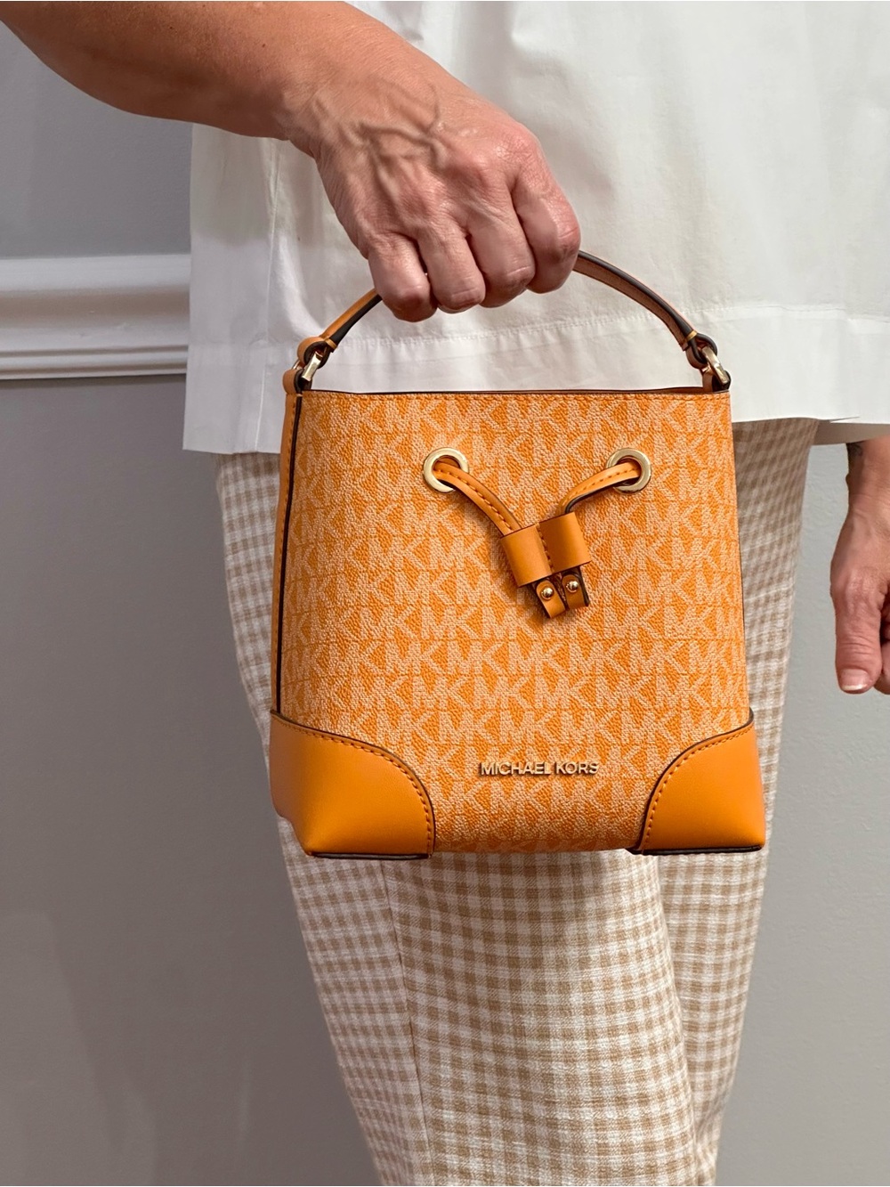 Michael Kors Orange Logo Drawstring Bucket Crossbody